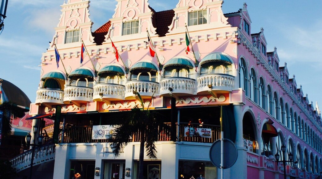 The Royal Plaza Mall is the most traditional shopping area in Oranjestad. This very pink and ornate building houses an attractive collection of shops that offers a little bit of everything. It is conveniently located right across the cruise ship terminal right in the middle of Oranjestad, walking distance to the bus station, museums , galleries and shopping malls.