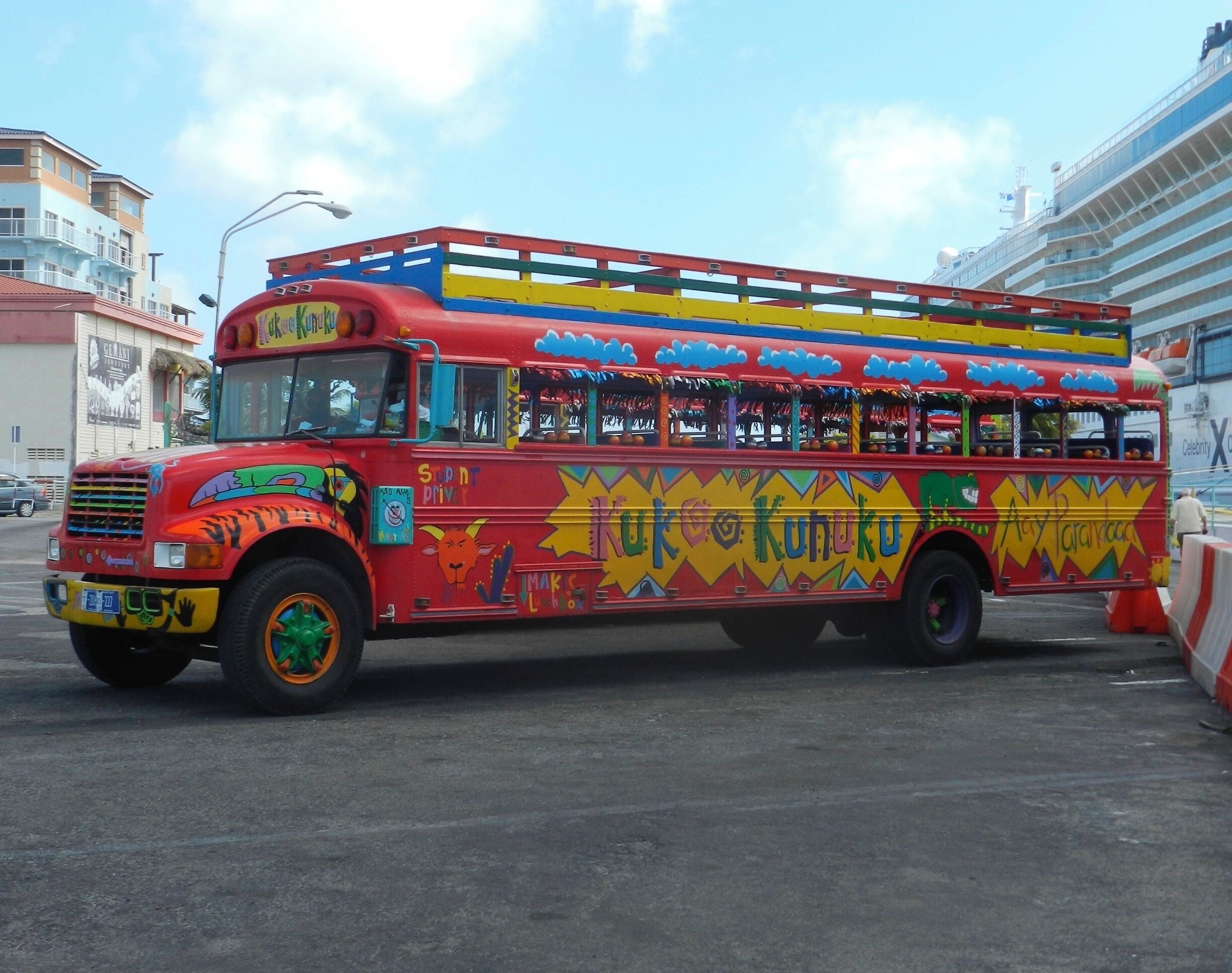 Although we didn't sign up for the Kukoo Kunuku party bus, there was one waiting when our cruise ship docked in Aruba.  The tour includes transportation to dinner at a local restaurant, 2 drinks, and 3 bar stops - and then dropped off later at the cruise pier; provided the ship is still there and hasn't already sailed to the next destination!  #Red