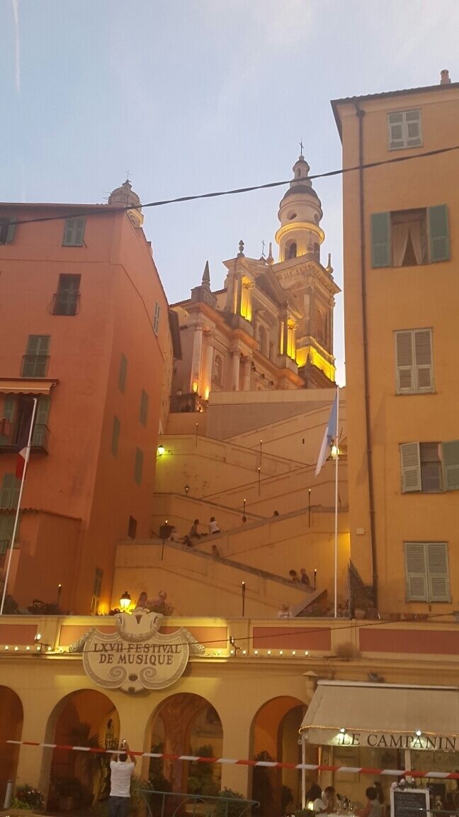 A historic building with a dome and arches, labeled "LXVI-FESTIVAL DE MUSIQUE."