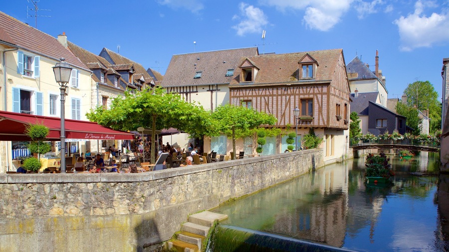 Montargis featuring a river or creek, outdoor eating and a bridge