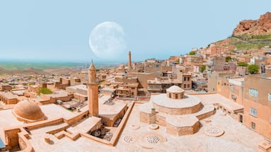 Traditional pink stone houses of Mardin Old town with full moon - Mardin, Turkey "Elements of this image furnished by NASA "