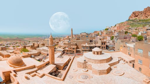 Traditional pink stone houses of Mardin Old town with full moon - Mardin, Turkey "Elements of this image furnished by NASA "