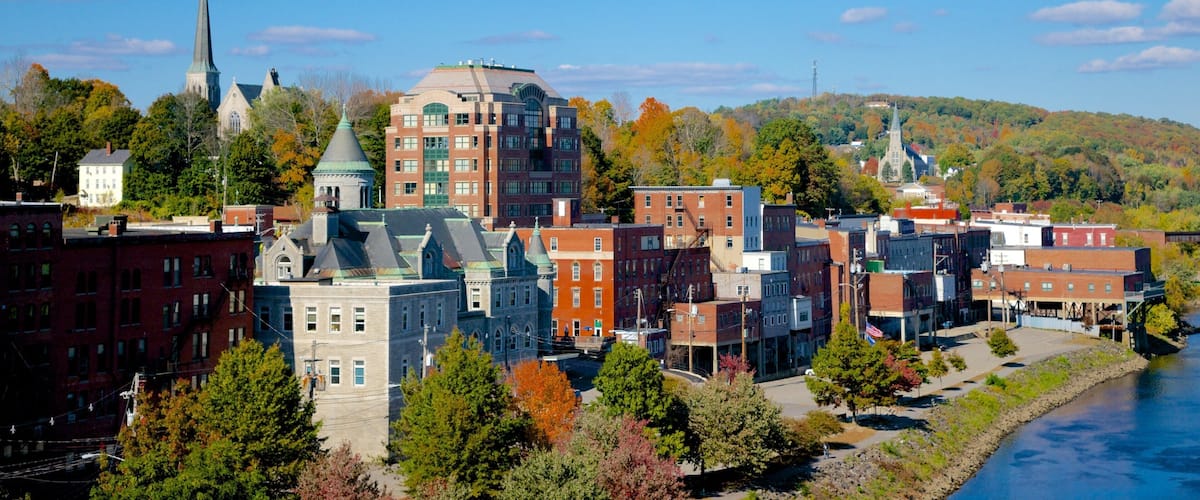Augusta showing a city and a river or creek