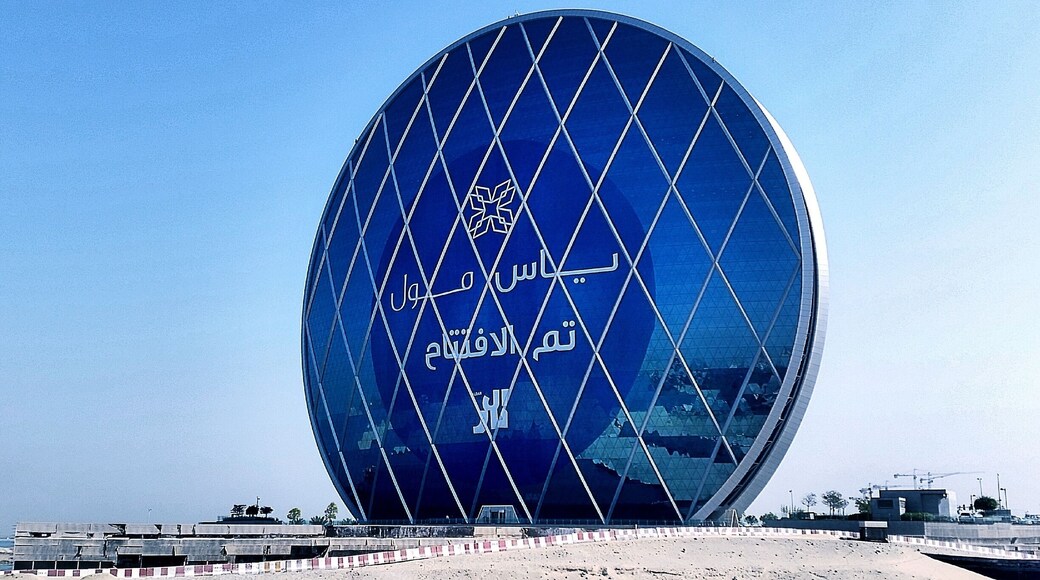 The HQ headquarters, a truly unique building rising against the Arabian Sea. Abu Dhabi, United Arab Emirates