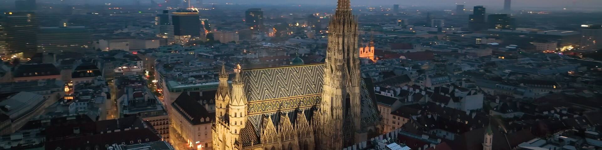 Aerial view of famous places St. Stephen's Cathedral Stephansdom at night. Mother church of the Roman Catholic Archdiocese of Vienna. Austria