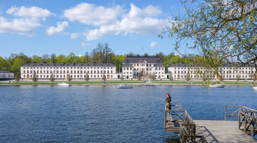 Unrecognizable person fishing during springtime in Stockholm. The city is built on 17 islands.