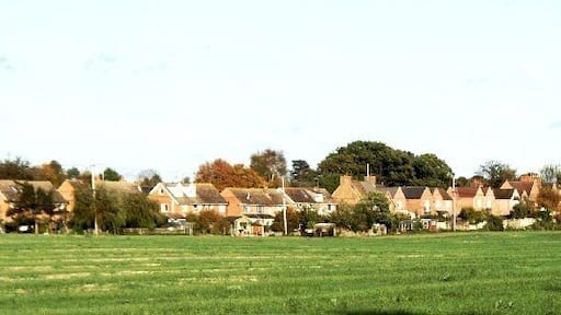 Backs of houses, Culham. These houses stand on the south side of Culham's village street. The photograph was taken looking north-east from the towpath beside Culham Cut in the adjoining square.