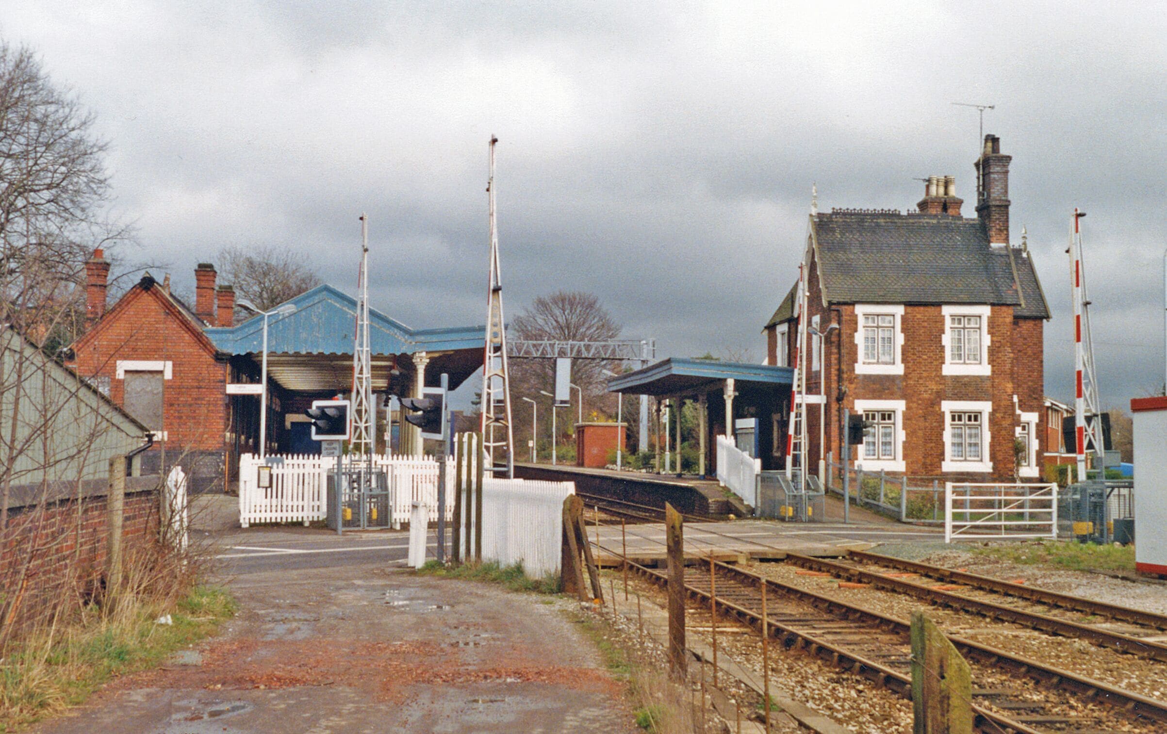 Alsager station, 1994. View eastward, towards Kidsgrove, Stoke-on-Trent etc.: ex-North Stafford Railway Crewe - Kidsgrove - Stoke secondary main line, which was electrified in 2003, for diversions off the WCML, after I took this photograph and nearly 40 years after the WCML itself.