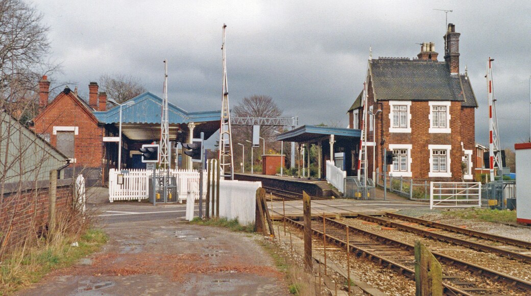 Alsager station, 1994. View eastward, towards Kidsgrove, Stoke-on-Trent etc.: ex-North Stafford Railway Crewe - Kidsgrove - Stoke secondary main line, which was electrified in 2003, for diversions off the WCML, after I took this photograph and nearly 40 years after the WCML itself.