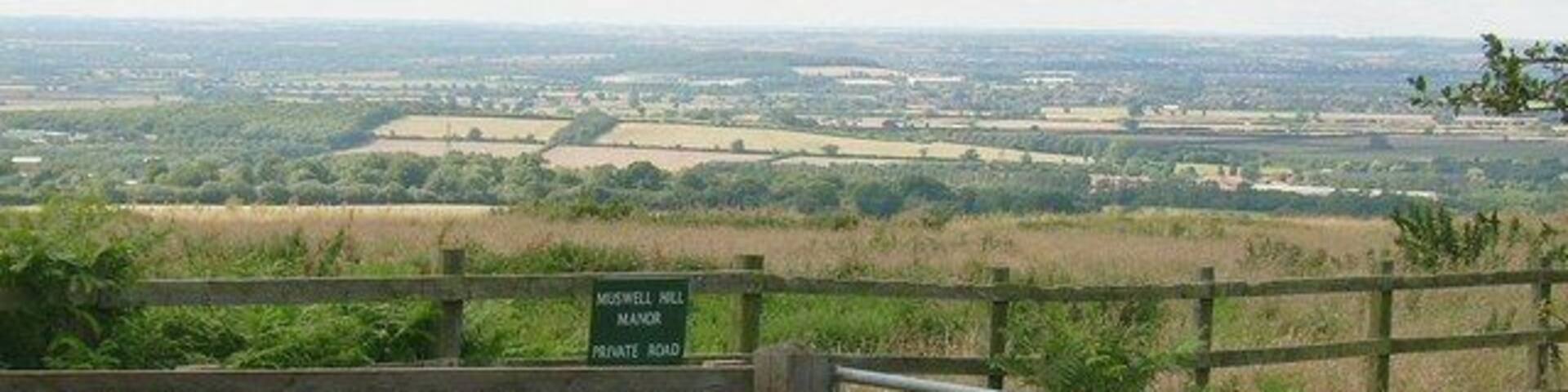 View from top of Muswell Hill, near Brill The stunning view of the flat landscape below towards Bicester, from the top of Muswell Hill. This hill peaks at a slightly higher altitude than neighbouring Brill Hill by approx 12 metres. Note the large structures of Bullingdon Prison and the MOD site at Arncott around the centre of the background.