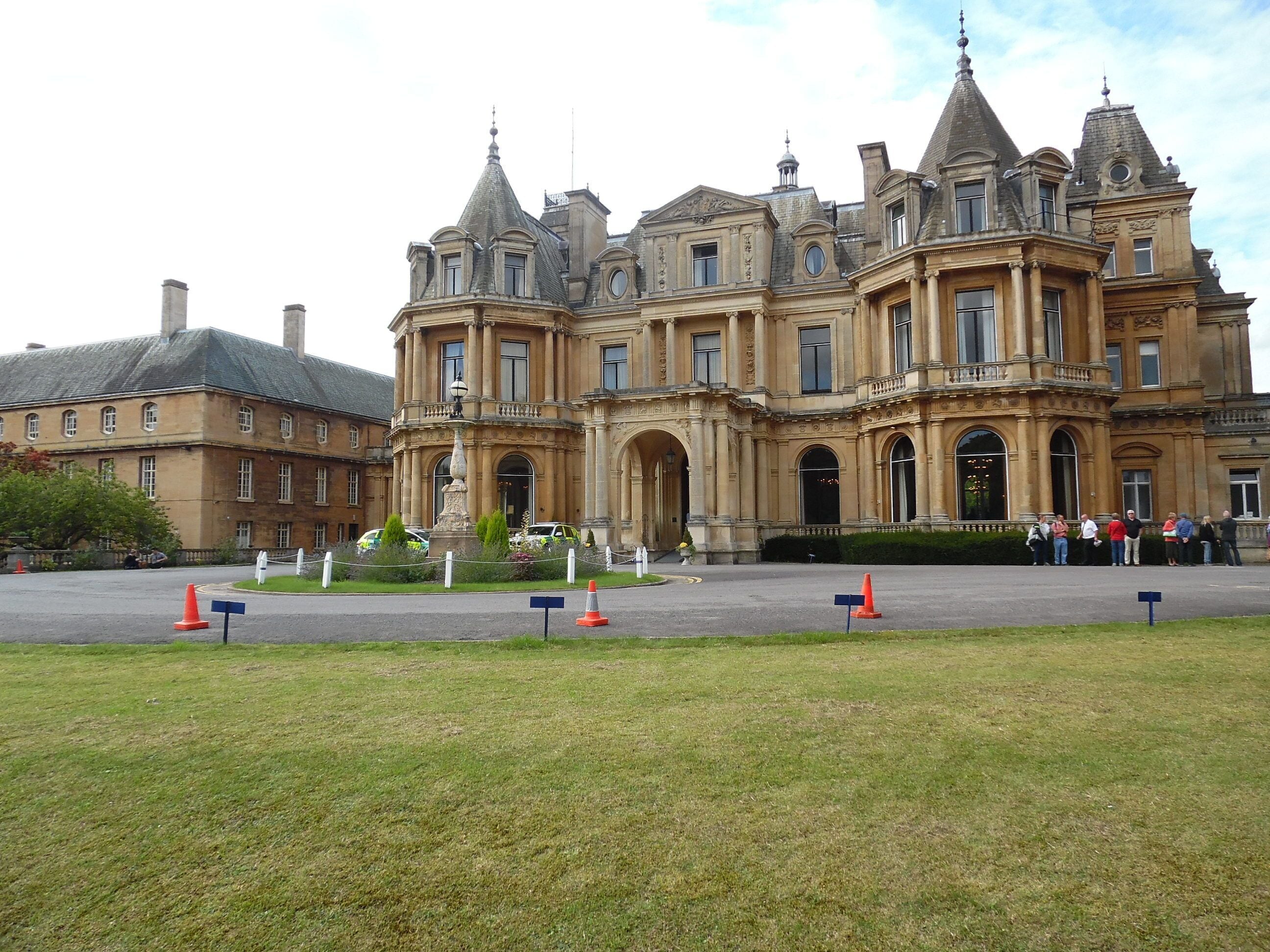 Front Entrance of Halton House (2). This photo shows the House which was built by Alfred de Rothschild of the famous banking family in the early 1880s, principally to entertain Victorian high society in the most lavish style imaginable. It was part of the Halton Estate which in 1919 became Royal Air Force Halton and this Mansion became the Officers' Mess, known since as Halton House. On the left of the photo can be seen the West Wing which replaced the derelict Winter Garden. This Wing is now used as accommodation for living-in officers.