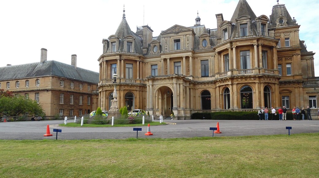 Front Entrance of Halton House (2). This photo shows the House which was built by Alfred de Rothschild of the famous banking family in the early 1880s, principally to entertain Victorian high society in the most lavish style imaginable. It was part of the Halton Estate which in 1919 became Royal Air Force Halton and this Mansion became the Officers' Mess, known since as Halton House. On the left of the photo can be seen the West Wing which replaced the derelict Winter Garden. This Wing is now used as accommodation for living-in officers.