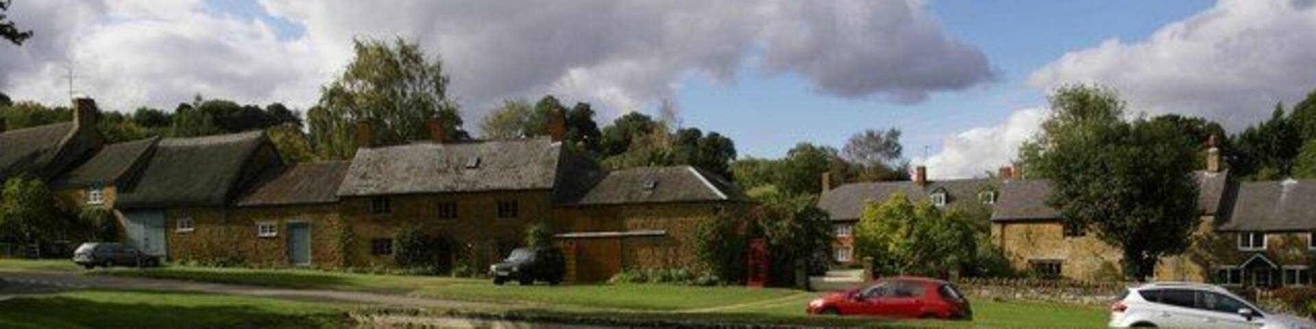Warmington village centre The centre of this pretty Warwickshire village seen from across the village pond.