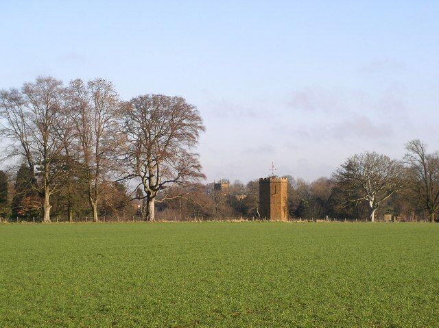 Wroxton, Oxfordshire: tower of All Saints' parish church (centre left) and dovecote of Wroxton Abbey (centre right). Sanderson Miller designed the church tower and may have designed the dovecote.