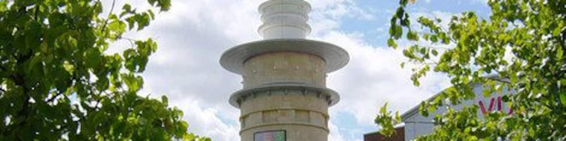 Festival Place and amphitheatre This round tower at the easternmost end of the Festival Place shopping centre overlooks a grass amphitheatre. There are numerous restaurants at this end of Festival Place, and a large "vue" cinema (visible to the right of the tower) occupies the floor above.