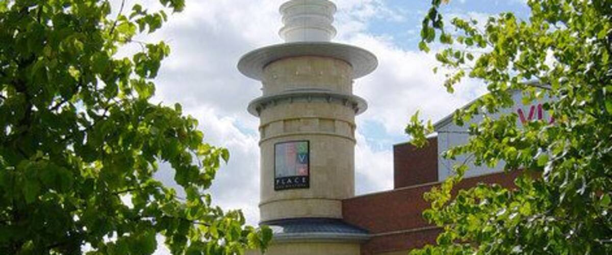 Festival Place and amphitheatre This round tower at the easternmost end of the Festival Place shopping centre overlooks a grass amphitheatre. There are numerous restaurants at this end of Festival Place, and a large "vue" cinema (visible to the right of the tower) occupies the floor above.