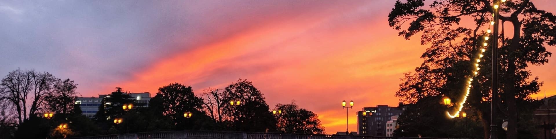 Sunset over town bridge in the center of Bedford. The current bridge was opened in 1813 on the site of a previous much older bridge.
