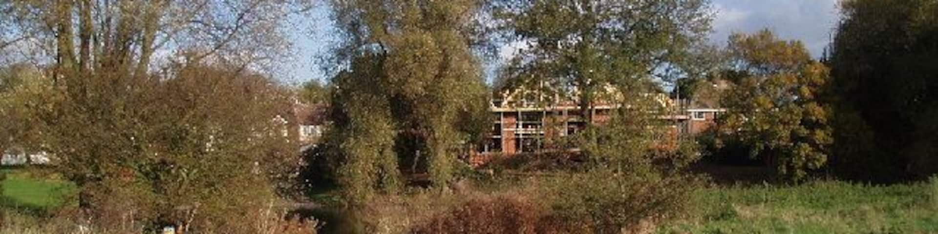 Ford. Ford of the river Great Ouse as it passes Clapham, looking across towards a new house being built on the far (Clapham) side. The ford itself doesn't look particularly suitable for normal cars ;-) (it's only a bridleway and farm track on the photographer's side)
