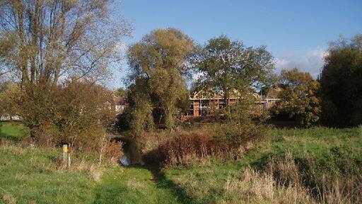Ford. Ford of the river Great Ouse as it passes Clapham, looking across towards a new house being built on the far (Clapham) side. The ford itself doesn't look particularly suitable for normal cars ;-) (it's only a bridleway and farm track on the photographer's side)