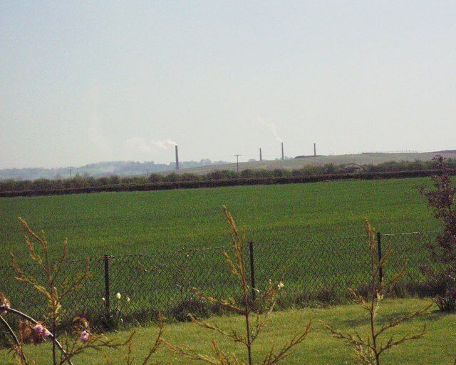 Bedford not Burnley. These smoking chimneys look like a picture of a small northern industrial town in the 1950's but are in fact the brickworks near Bedford 2007.
