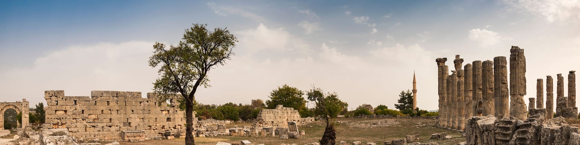 Marble columns of Zeus temple at Uzuncaburc Ancient city panoromic view. Uzuncaburc antique city is in the rural area of Silifke district. Mersin, Turkey