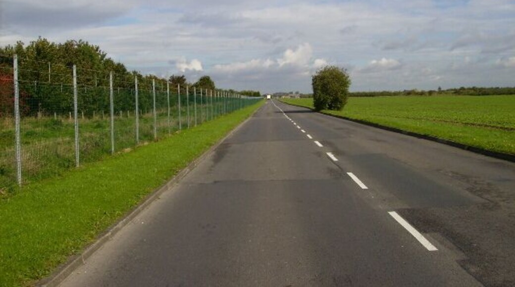 Access road into Normanby Barracks Leconfield, East Riding of Yorkshire, England. The camp perimeter fence is on the left of the picture.