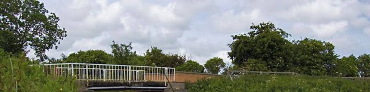 Sandholme Bridge, Leven, East Riding of Yorkshire, England. Seen from the south bank of the canal. The bridge carries Sandholme Lane over the Leven Canal.