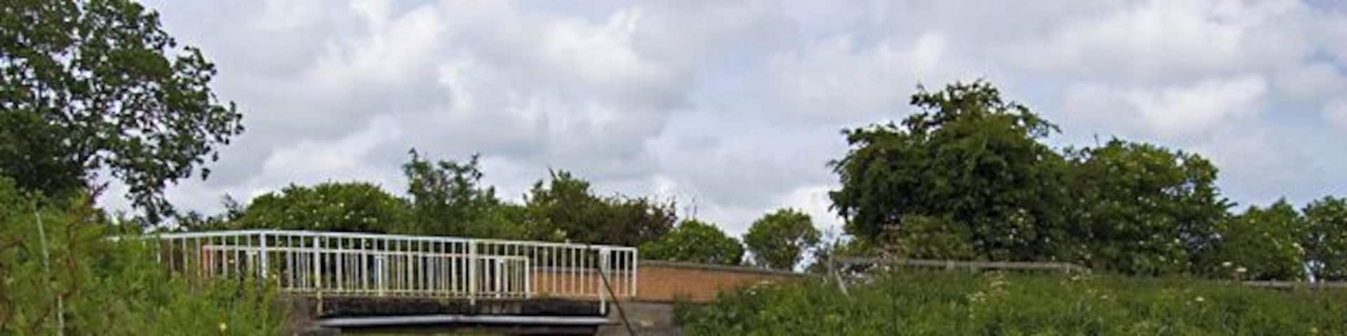 Sandholme Bridge, Leven, East Riding of Yorkshire, England. Seen from the south bank of the canal. The bridge carries Sandholme Lane over the Leven Canal.