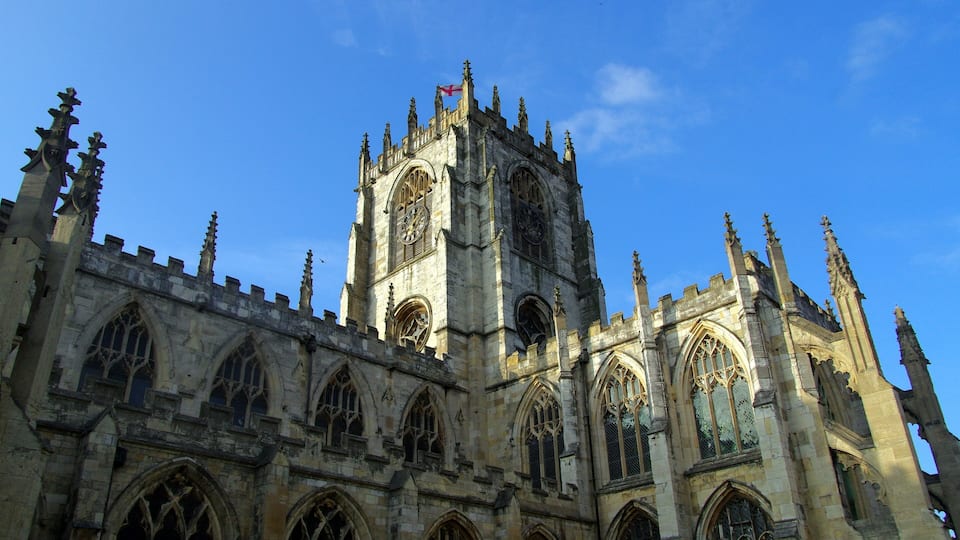 A Gothic cathedral with pointed arches and intricate stonework.