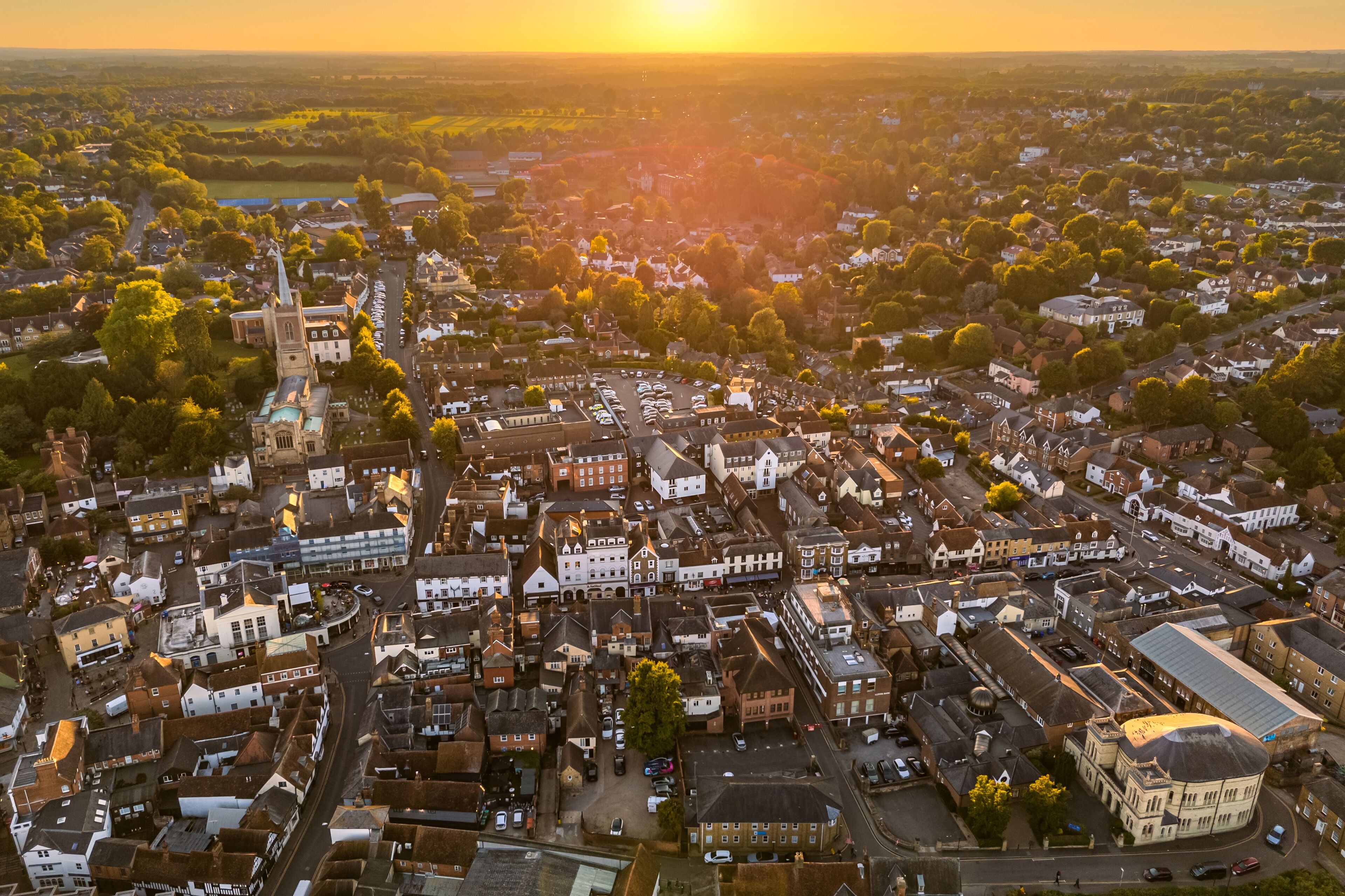 Aerial drone shot during sunset over the town of Bishops Stortford in England