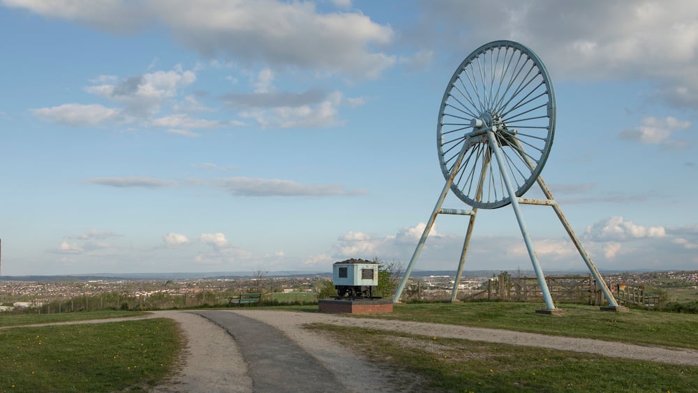 Newcastle-under-Lyme, Staffordshire, uk, 04,25.2022,Apedale pit wheel memorial and coal tub located in Apedale community park, formerly opencast mining