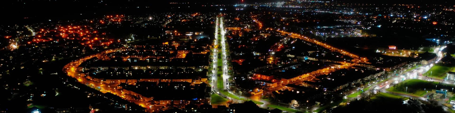 Beautiful aerial view of Bridgwater cityscape with bright glowing night lights in Somerset, UK
