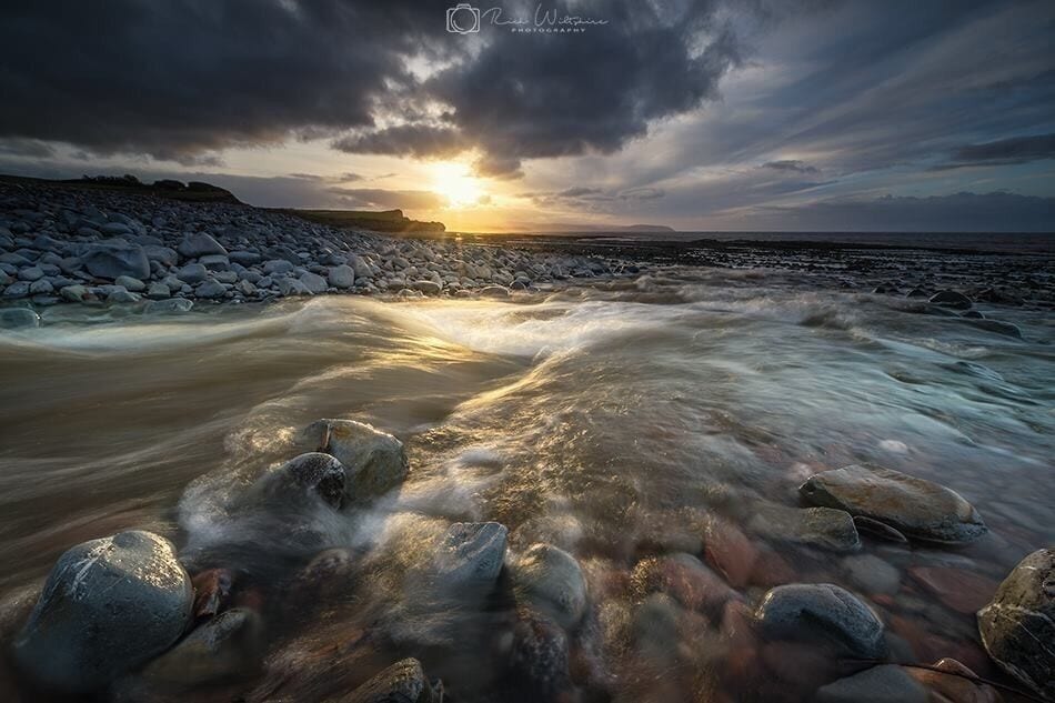 Golden glow over the beautiful Kilve Beach 