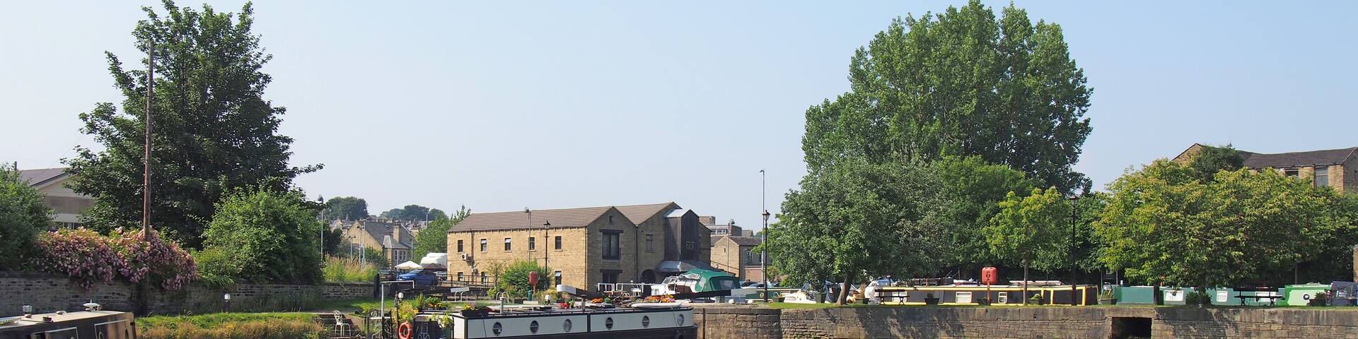 scenic view of brighouse basin with boats and mooring in west yorkshire