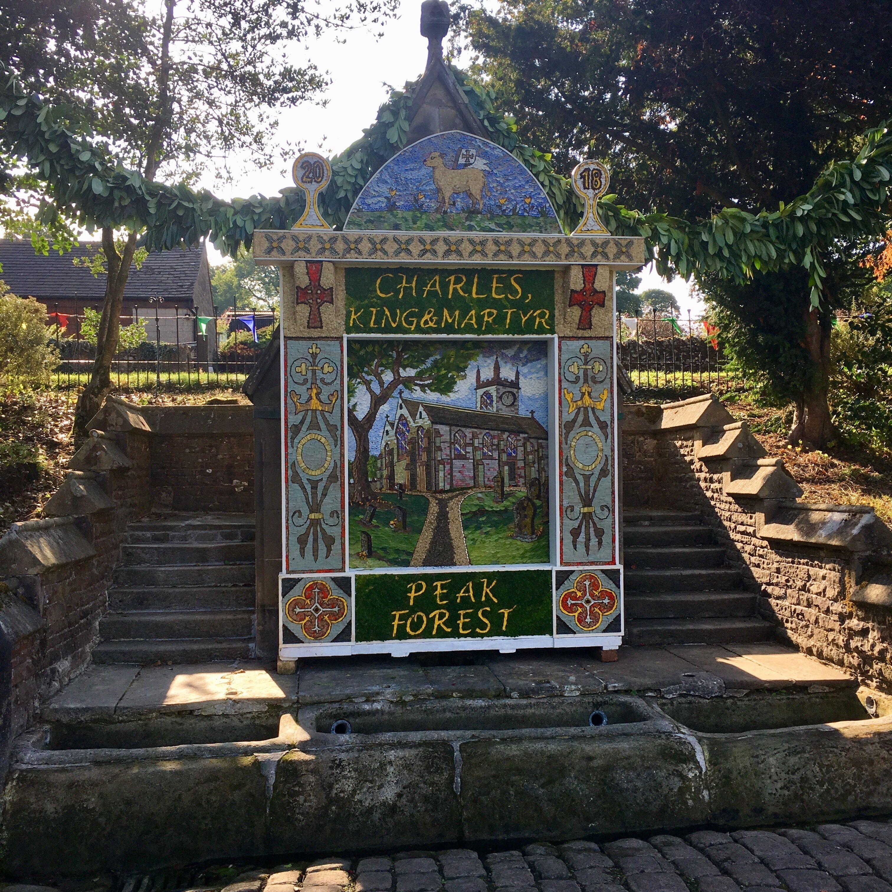 Wormhill well dressing, Derbyshire. The origins of well dressing are now lost in the mists of time, but are most likely Pagan. The highly detailed pictorial scenes such as this are unique to Derbyshire.