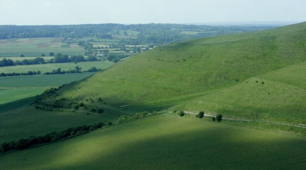 North west from Oliver's Castle Beacon Hill is in the foreground. The track round the bottom starts on Consciences Lane then follows the contours on Roundway Hill, Oliver's Castle and Beacon Hill finishing at Heddington not too far from The Ivy Inn.