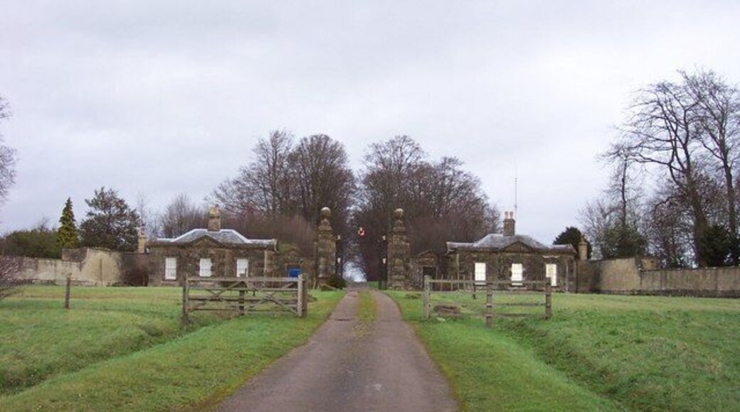 Gatehouses by the entrance to Sherborne Park A fine symmetrical view from the A40.