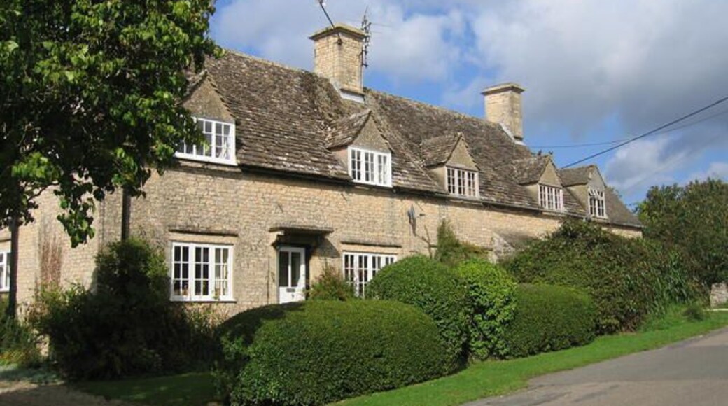 Great Rissington. Typical village cottages in the lane leading from the village green to the church.
