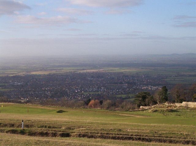 View of Bishop's Cleeve from Cleeve Hill. Looking west from the golf course on Cleeve hill and the ever expanding "village" of Bishop's Cleeve. Now a commuter satellite of Cheltenham.