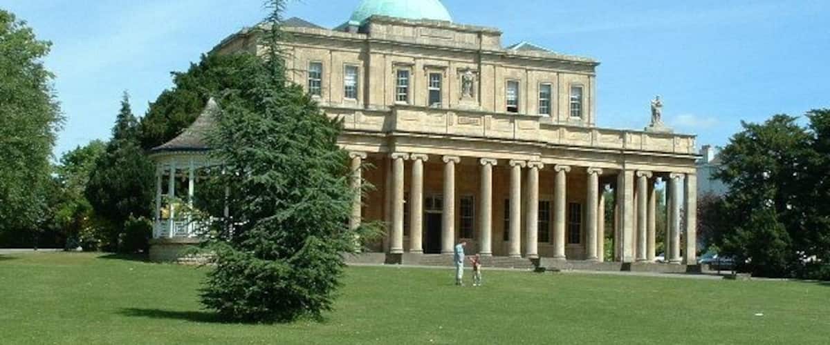 Pittville Pump Room. Pittville Pump Room is a beautiful, historic Grade One listed property set in parkland. It is one of Cheltenham's finest 'Regency' buildings and was the largest of the town's spas.