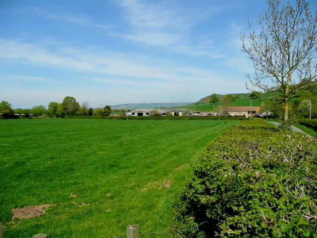 View to Grange Farm, Woolstone Looking north with Oxenton Hill to the right and Bredon Hill in the centre distance.