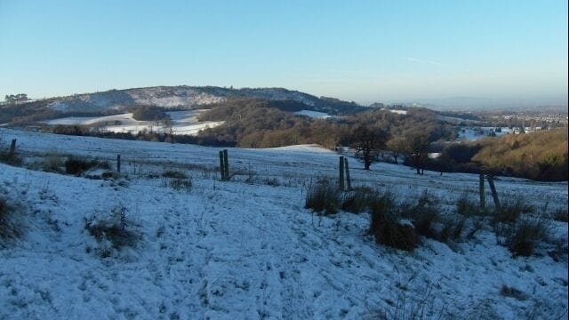 Winter on Timbercombe A snowy day on the Timbercombe on the lower slopes of Ravensgate Hill. Leckhampton Hill is visible across the valley.