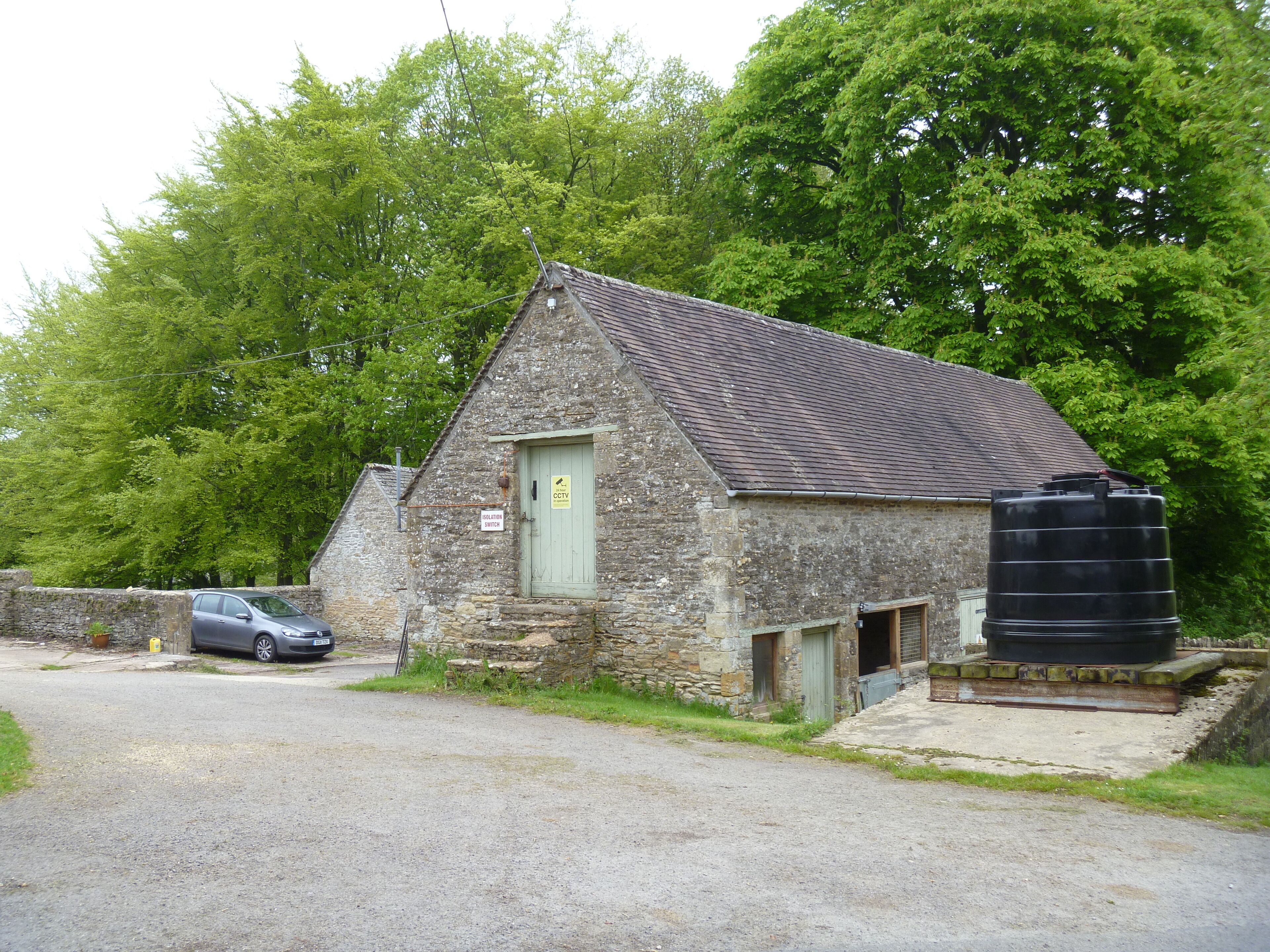 Manor Farm, Notgrove, Gloucestershire. One of the buildings of Manor Farm. Seen from the minor road.