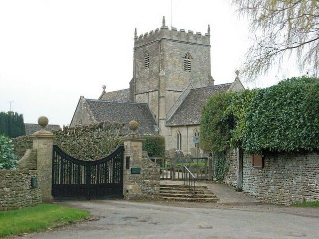 The Church of St. John the Baptist , Great Rissington The first set of gates are the entrance to Manor Farm.