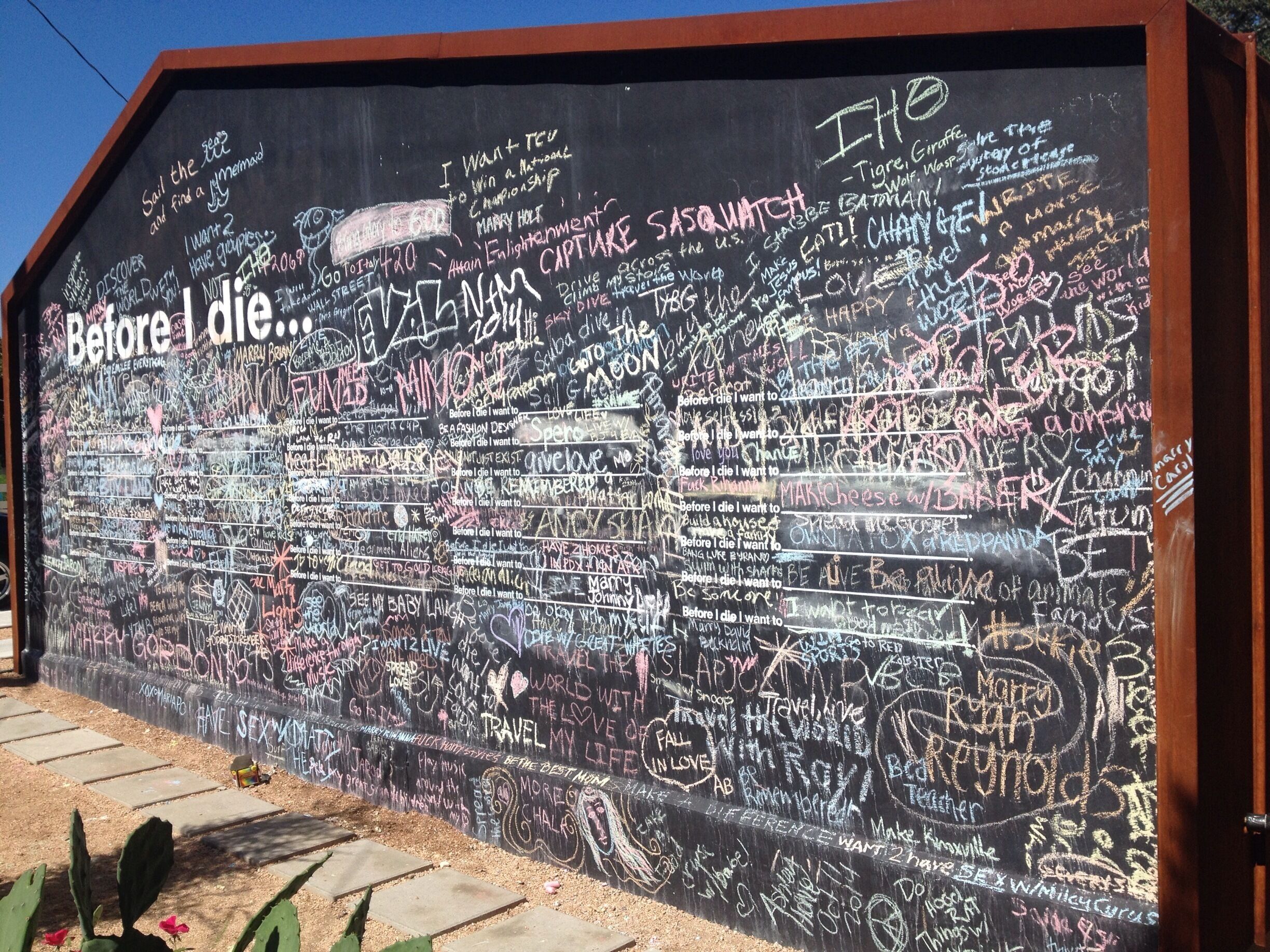 Very cool wall. I was there to help the guy wash it and I was able to be the first one to sign it. 