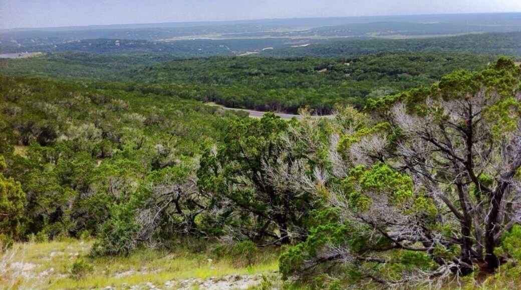 I got to this spot by hiking in the Warbler Vista area of the Canyonlands. The hike was well worth the view. I was speechless! If you keep driving past the trail head to the very top, there is even a lookout deck with ridiculously gorgeous views of the hill country.