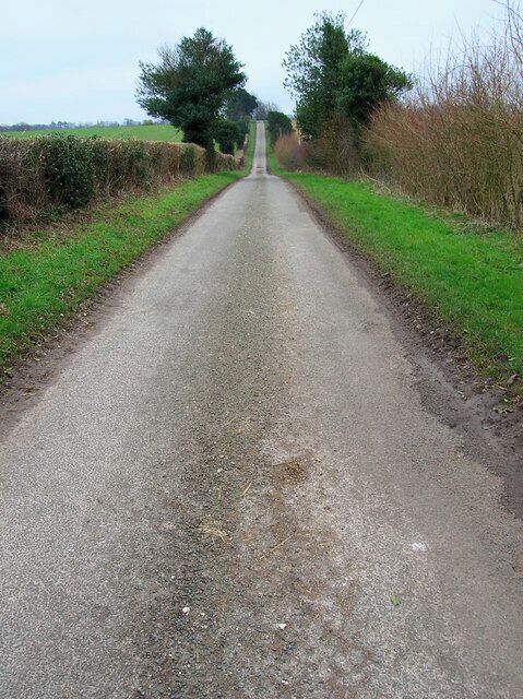 Unnamed Lane Its straightness suggests it was laid out when the surrounding land was enclosed. It also gives a good idea to how the land undulates around this area. The junction with Hylters Lane is just over the brow.