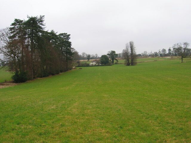 Upton Farm Taken from the footpath north of the B2141. The trees to the left mark the drive to the farm.