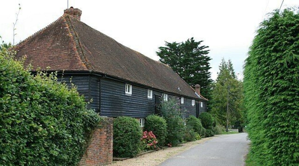 The Tithe Barn, Park Lane Situated in Park Lane, a private road (but also a public footpath) leading to Park Farm. The road is now very quiet, but the turn to the left, just after the Tithe Barn, was once a public road leading out to the Oving Road, but has been stopped up with the reservation of a public footpath.