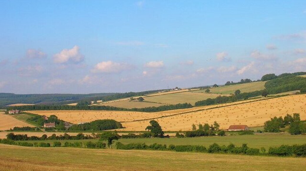 South Downs. Unnamed valley that takes the B2141 to Chilgrove. The farm to the left is Brickkiln Farm the building to the right is part of a pumping station, the slope on the right is Heathbarn Down. Taken from the bridleway that crosses the south west corner of the square.